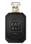 A black rectangular perfume bottle with a faceted clear glass cap and gold lettering that reads 'KAYALI ELIXIR III' on the front, shown against a plain white background.