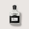 Creed Aventus perfume bottle on a light gray background