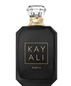 Kayali Elixir II perfume bottle in matte black glass with a faceted clear crystal cap and gold lettering on the front label, shown on a plain white background.