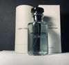 Louis Vuitton perfume bottle with packaging on a dark background