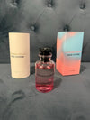 Louis Vuitton perfume bottle with packaging on a gray surface