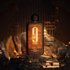 Perfume bottle labeled '9 Elixir' by Afnan on a dark background