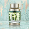 Perfume bottle with silver cap and green glass body on a light blue background