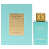 Shaghaf Oud Tonka perfume bottle and packaging on a light blue background