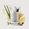 Silver Creed Himalaya perfume bottle surrounded by natural elements on a light gray background