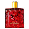 Versace Eros Flame Eau de Parfum bottle with red design and gold cap on a white background