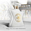 White perfume bottle with gold accents on a decorative background