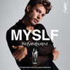 YSL advertisement with a man holding a bottle of YSL perfume against a gray background